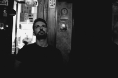 Man watching TV in a Bar, Madrid. 2018.